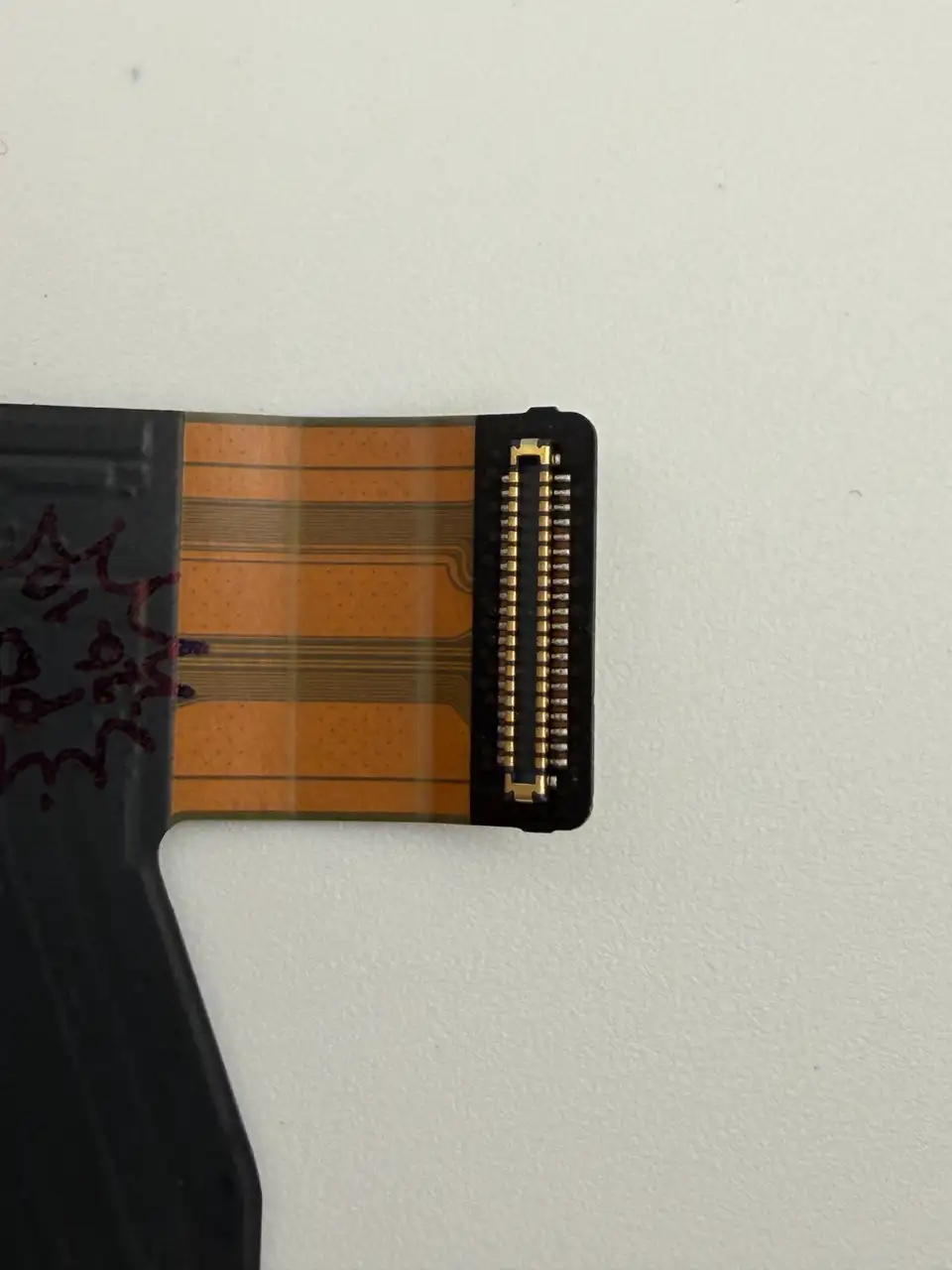 Original Pulled iPhone 12 Charging Port Flex Cable photograph 2