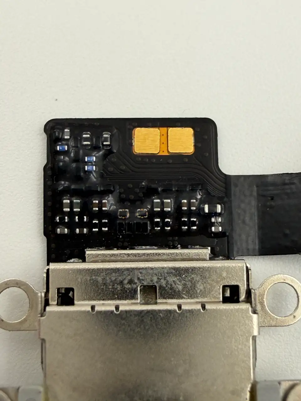 Original Pulled iPhone 16 Pro Charging Port Flex Cable photograph 2